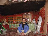 Tibet Kailash 10 Kora 04 Zutulpuk Gompa Milarepas Cave From Sam and Shelly The monk didnt let me take a photo of Milarepas cave, with a glass case holding Milarepas nettle-green stone statue, hand to ear. The statue is made of brass and is said to have been made by Milarepa himself shortly before his death. No this is not me. This photo is from  Sam & Shelly Tibet Trip Summer 2004.